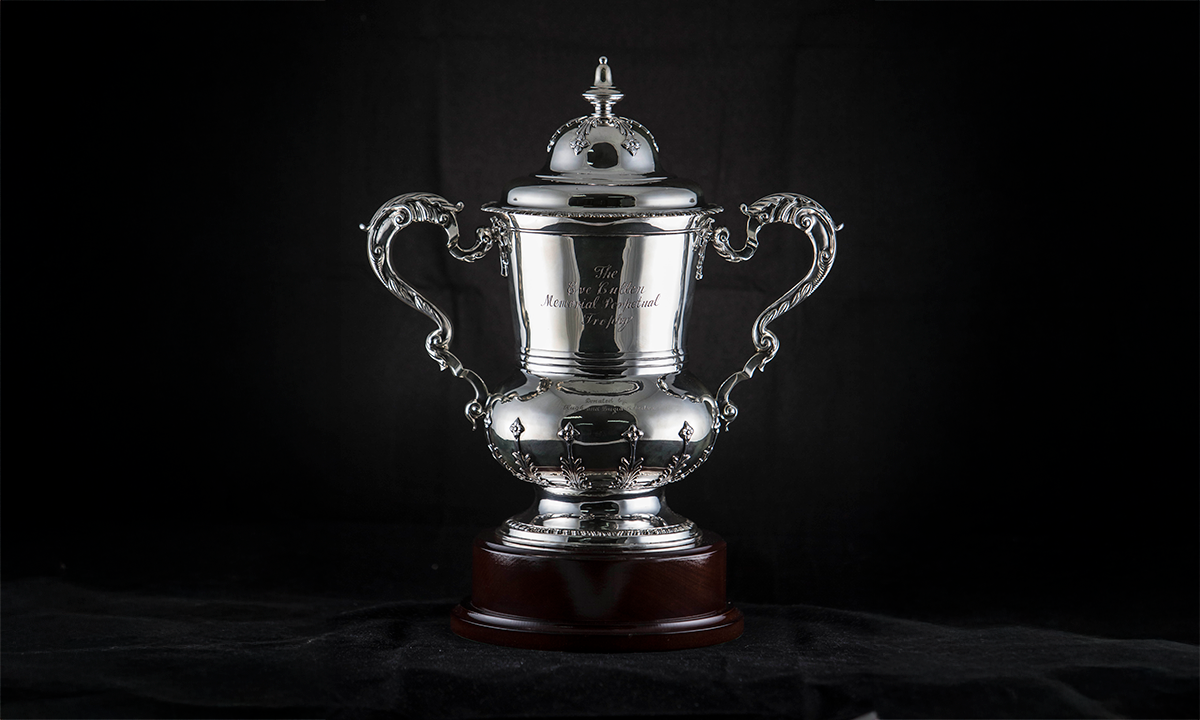 Silver lidded trophy with artistically designed twin handles, mounted on a double tier base. First presented in 2008. 