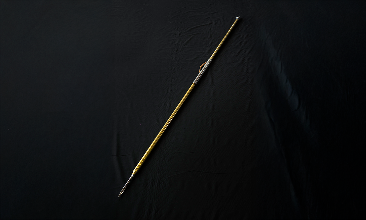 Trophy of abstract design in oak, stainless steel and brass, arched with applied brass medallions, raised on a circular foot. First awarded in 1998. 