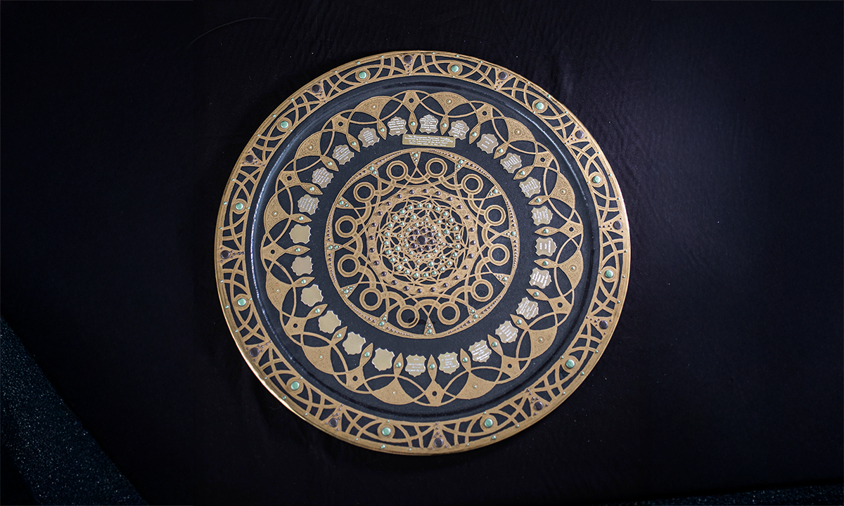 Celtic style glass platter with hand painted gilded scroll decoration with green enamelled jewels. First awarded in 1998.