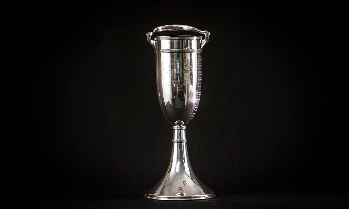 Tall, silver-plated champagne cooler. First awarded in 1953.