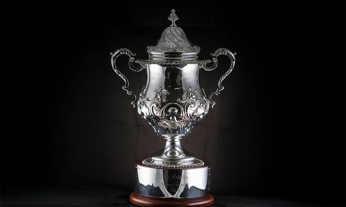 Edwardian sterling silver in handled cup, with conical lid, and two scroll handles. First awarded in 2004.