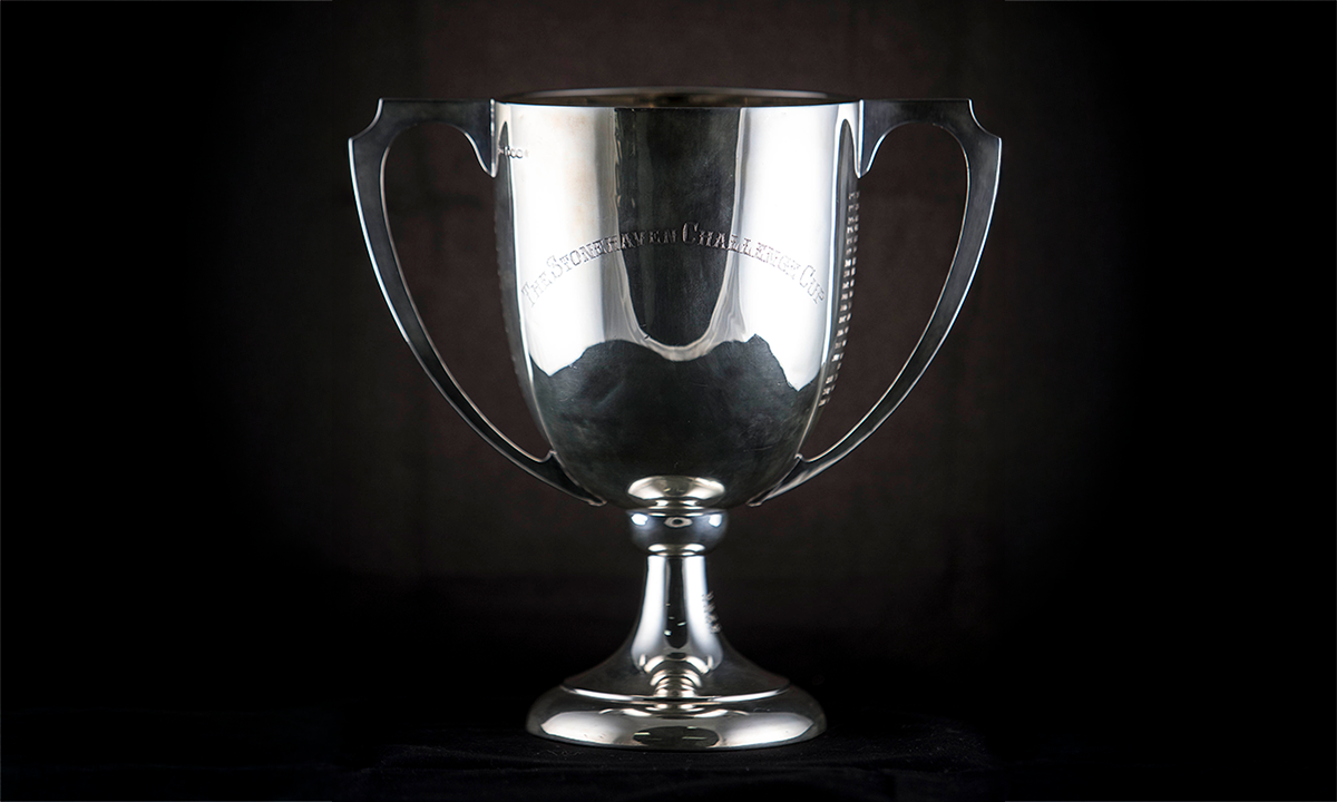 Sterling silver cup with two angular handles. First awarded in 1930.