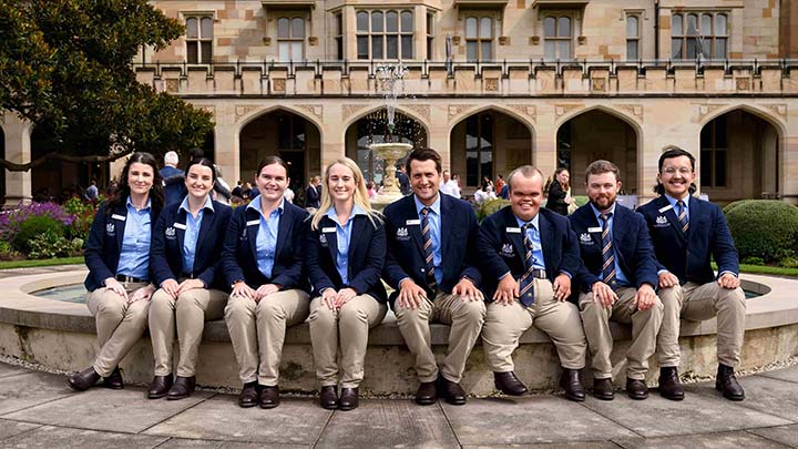 The 2025 RAS Rural Achiever finalists sitting by a fountain at Government House, Sydney.